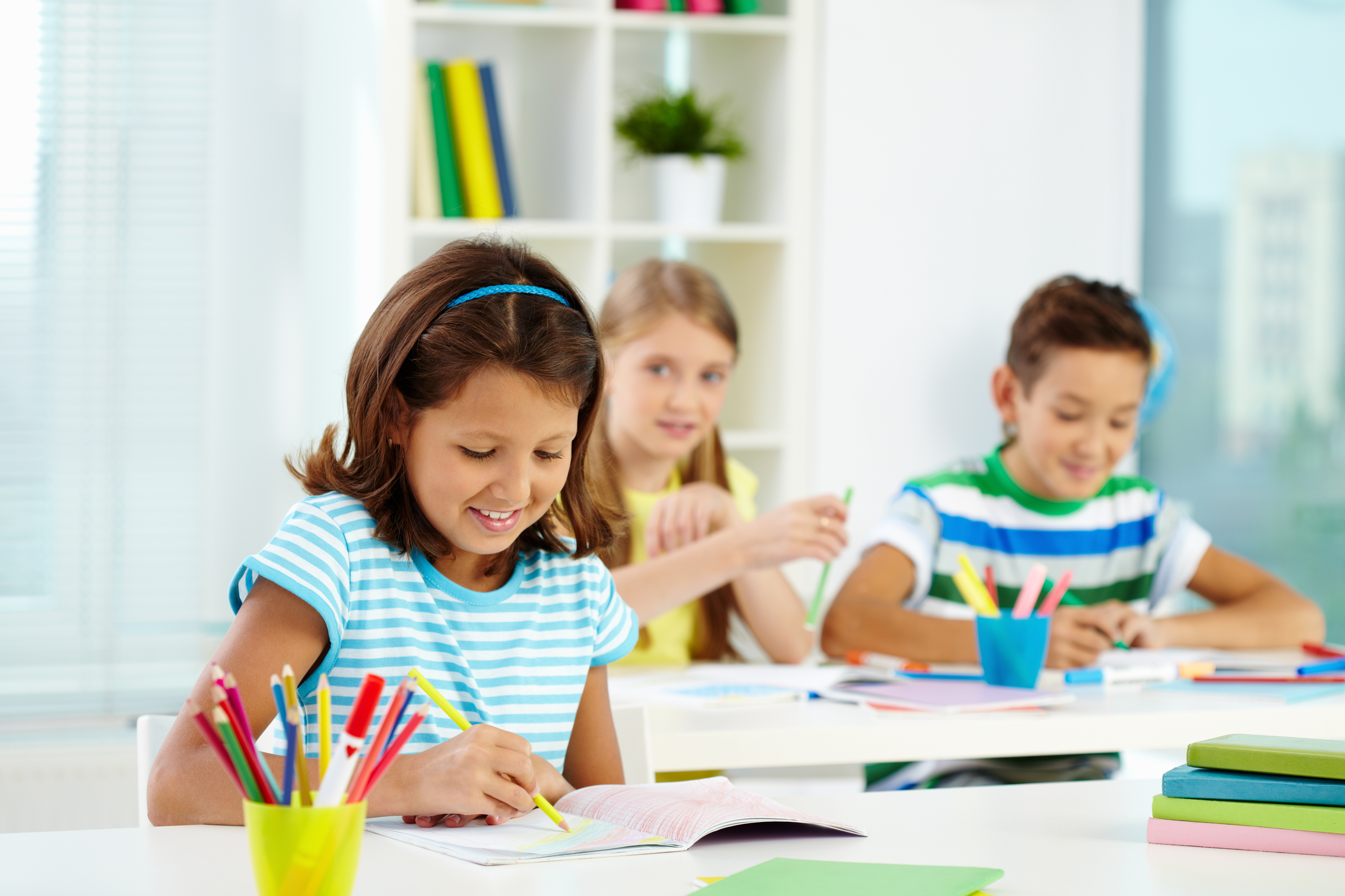 Students collaborating in primary classroom